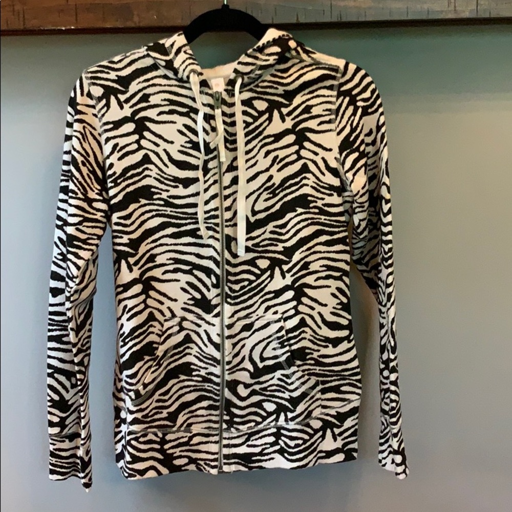 Lucy size M zip up Hoodie.  Never worn, no tags.